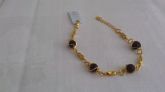 Pulseira folheada a ouro com bolas