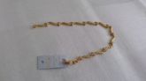 Pulseira folheada a ouro formato de flor