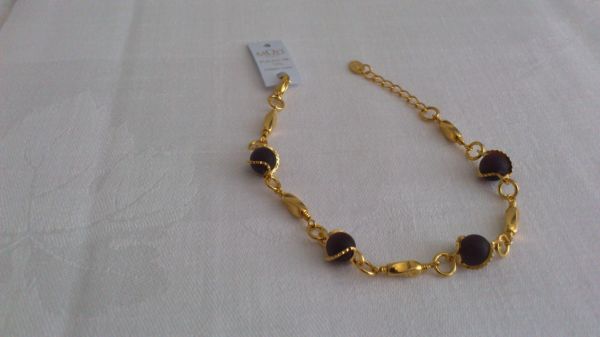 Pulseira folheada a ouro com bolas